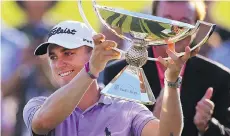  ?? CURTIS COMPTON/ATLANTA JOURNAL-CONSTITUTI­ON VIA AP ?? Justin Thomas celebrates winning the FedEx Cup in Atlanta on Sunday.