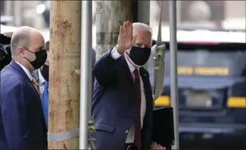  ?? AP PHOTO/MATT SLOCUM ?? President-elect Joe Biden waves as he arrives at The Queen theater, Friday, in Wilmington, Del.