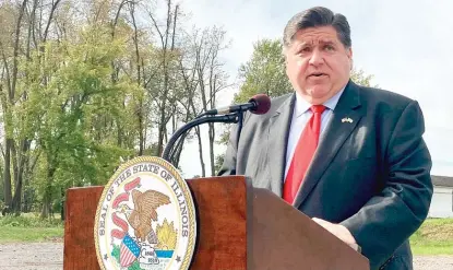  ?? AP FILE ?? Gov. J.B. Pritzker, shown at an October news conference, signed the new congressio­nal map on Tuesday.