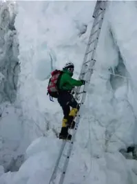  ??  ?? RIGHT: Ascending the Khumbu Icefall to Camp 1 on Mount Everest