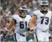  ?? THE ASSOCIATED PRESS ?? Isaac Seumalo, right, went out injured in training camp in 2016 and promptly lost his starting spot then to Stefen Wisniewski, left. Now the status update is on the other Eagles’ foot.