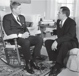  ?? Photo / AP ?? John F. Kennedy’s rocking chair in this 1961 photo has sold for $75,000.