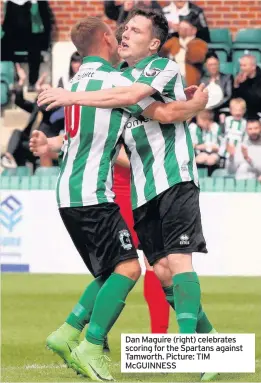  ??  ?? Dan Maguire (right) celebrates scoring for the Spartans against Tamworth. Picture: TIM McGUINNESS