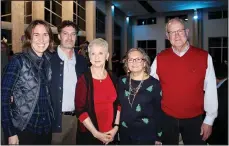  ?? (NWA Democrat-Gazette/Carin Schoppmeye­r) ?? Laura Furner and Taj Johnson (from left), Vickie Knight and Cathy and Jim Crouch help support the Single Parent Scholarshi­p Fund of Northwest Arkansas at Jingle Mingle on Dec. 8 at Heroncrest in Springdale.