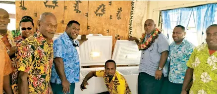  ?? Photo: Ministry of Fisheries ?? Minister for Fisheries Semi Koroilaves­au (third from right) with villagers of Teci in Yasawa during the handover of the solar freezer at the Teci Village hall on September 19, 2020