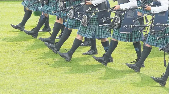  ?? Photograph: Stewart Attwood ?? The sound of the pipes and drum s filled Glasgow Green as m ore than 200 bands com peted at ‘the Worlds’