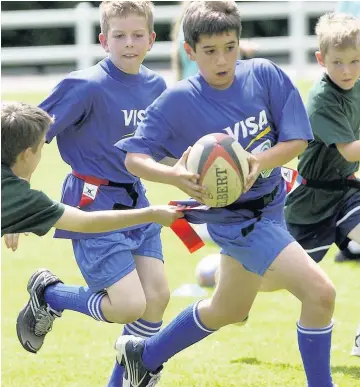  ??  ?? > Three years into a partnershi­p with the WRU, Welsh schools are reporting benefits for pupils both on and off the field