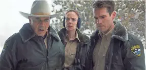  ?? ORION PICTURES ?? Sheriff Hadley (Robert Forster, left) investigat­es a vicious murder with fellow officers Julia (Riki Lindhome) and his son John (Jim Cummings) in “The Wolf of Snow Hollow.”