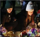  ?? AL GOLDIS — THE ASSOCIATED PRESS ?? Mourners attend a vigil on the grounds of Michigan State University in East Lansing, Mich., on Wednesday.