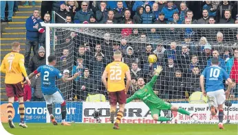  ??  ?? Rangers’ James Tavernier makes it 2-1 from the spot