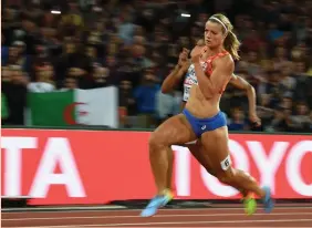  ??  ?? DAFNE SCHIPPERS of the Netherland­s retained her world 200 meters title.