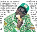  ??  ?? President Robert Mugabe cools himself with an ice cream