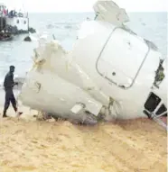  ??  ?? Part of the Wreckage of Buffalo plane removed from coast of Gabon soon after the accident