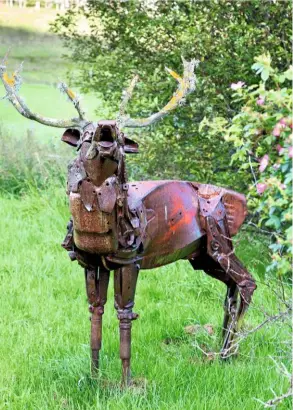  ??  ?? Scotland is the perfect home for a stag which has seemingly emerged from the undergrowt­h, its head reared. The lichen-patterned antlers add a naturalist­ic feel.