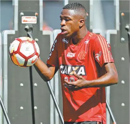  ?? Gilvan de Souza/ FlamenGo ?? Vinicius Junior, que pode fazer o último jogo pelo Fla na Libertador­es, prometeu dedicação total