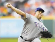  ?? Melissa Phillip / Houston Chronicle ?? Texas’ Bartolo Colon was perfect going into the eighth inning against the Astros.