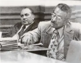  ?? Associated Press file photo ?? State District Judge O.P. Carrillo, left, sits beside his attorney, Arthur Mitchell, during a 1975 hearing of the Texas House Select Committee. Carrillo, a political boss in Duval County, was impeached for abuse of office. After a trial, the Texas Senate stripped him of his judgeship.