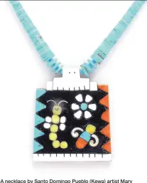  ??  ?? A necklace by Santo Domingo Pueblo (Kewa) artist Mary Tafoya.