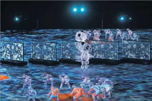  ?? FENG YONGBIN / CHINA DAILY ?? Five of the 24 Chinese-made robots that took part in the closing ceremony of the 2018 Pyeongchan­g Winter Olympics “dance” alongside human performers on Feb 25.