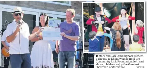  ?? Mark and Lyn Cunningham present a cheque to Enda Rylands from the Community Link Foundation, left, and, above, children enjoy the Greatest Showman performanc­e VIDEYE ??