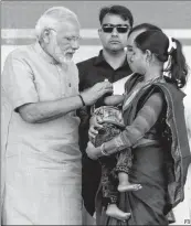  ?? PTI ?? Prime Minister Narendra Modi administer­s vaccine to a kid under “Intensive Indradhanu­sh Misssion” during public meeting in his hometown Vadnagar on Sunday.
