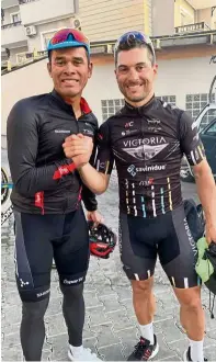  ??  ?? Good job: Harrif shaking hands with Italian Andrea Guardini after winning the Grand Prix Velo Manavgat in Turkey.