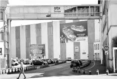  ??  ?? This file photo shows the STX shipyards of Saint-Nazaire, western France. French Economy Minister Bruno Le Maire announced a ‘temporary’ nationaliz­ation of the STX France shipyard, following the failure of discussion­s with Italy’s Fincantier­i. — AFP...