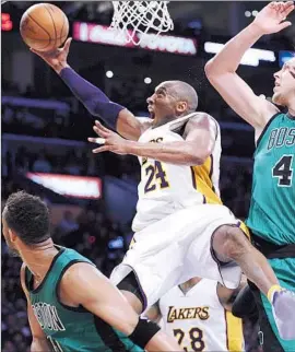  ?? Wally Skalij
Los Angeles Times ?? KOBE BRYANT gains separation from Boston’s Kelly Olynyk, right, as he elevates toward the basket in the third quarter of his last game against the Celtics.