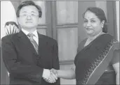  ??  ?? Foreign Secretary Sujatha Singh greets Liu Zhenmin, Vice-Minister of the Foreign Affairs of China.