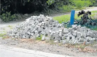  ?? Picture: MITCH HAUPT ?? STILL TO BE USED: Piles of brick pavers have been left behind after road work in Prince’s Avenue