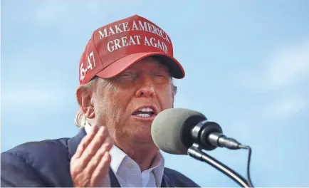  ?? SCOTT OLSON/GETTY IMAGES ?? Republican presidenti­al candidate former President Donald Trump has leaned into the use of inflammato­ry language on the campaign trail such as this appearance March 16 during a rally at the Dayton Internatio­nal Airport on March 16 in Vandalia, Ohio.