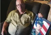  ?? AP PHOTO/THOMAS PEIPER ?? Donn Edmunds, a 25-year U.S. Army veteran who served in Vietnam, sits for a portrait in his living room in Cheyenne, Wyo., on Sept. 1.