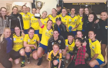  ??  ?? The Gold Coast United women's NPL Queensland side with the Faye Rodd Cup.