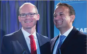  ??  ?? Defeated Fine Gael leadership contender Simon Coveney (left) with Taoiseach-in-waiting Leo Varadkar.