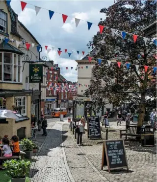  ??  ?? Characterf­ul streets full of traditiona­l shops converge on Ashbourne's Victoria Square.