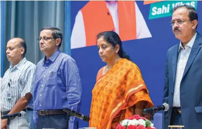  ?? PTI ?? Defence Minister Nirmala Sitharaman and others observe a two-minute silence for Air Commodore Sanjay Chauhan who lost his life in Indian Air Force fighter jet crash in Kutch region of northweste­rn Gujarat, in New Delhi on Tuesday. The aircraft was on a...