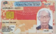  ??  ?? Jalong’s red identity card issued to him in 1963 upon the formation of Malaysia. His birth year is listed as 1943, instead of 1940.