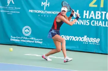  ?? Courtesy: Mohanan Oruvayalil ?? Top seed Kristina Mladenovic prepares to hit a backhand return to Natalia Vikhlyants­eva in the first round of the 21st Al Habtoor Tennis Challenge yesterday. The French woman won 6-3, 6-3.