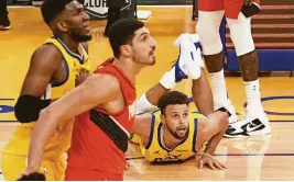  ?? KELLEY L COX/ USA TODAY SPORTS ?? Warriors guard Stephen Curry ( 30) follows his shot as it goes in during the fourth quarter on Sunday. Curry delivered the highest- scoring game in the NBA this season, finishing 18 for 31 and 8 of 16 on 3- pointers for a career- high 62 points.