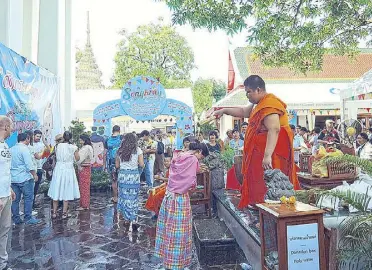  ??  ?? Water blessings are everywhere on Songkran dates, which is usually until April 15, but is extended for a week to accommodat­e travelers and locals returning from other parts of the country.