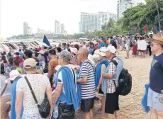  ?? CHAIYOS PHUPATTANA­PONG ?? Chinese tourists at Pattaya beach. Internatio­nal tourists are concentrat­ed in several destinatio­ns.