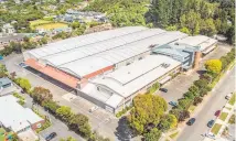  ??  ?? The former lower North Island head office and distributi­on warehousin­g premises tenanted by supermarke­t giant Foodstuffs in Upper Hutt.