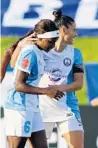  ?? ROBYN WALSH MCNEIL/ISI PHOTOS ?? The Pride’s Chioma Ubogagu, left, and Ali Krieger celebrate during Wednesday’s game.