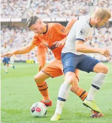  ?? — AFP photo ?? Newcastle United’s Swiss defender Fabian Schar (left) vies with Tottenham Hotspur’s English striker Harry Kane during the English Premier League football match between Tottenham Hotspur and Newcastle United at Tottenham Hotspur Stadium in London.