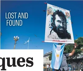  ?? Picture: AFP ?? A man holds a portrait of Santiago Maldonado, an activist who disappeare­d two months ago and whose body is thought to have been found two days ago. Maldonado, 27, was last seen being detained by paramilita­ry police.