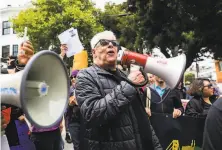  ?? Yalonda M. James / The Chronicle ?? Cleve Jones leads a march and tribute to Allan Baird for Baird’s long commitment to labor and to LGBTQ rights.