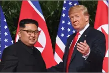  ??  ?? Kim, Trump: ‘A scene from a fantasy’