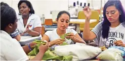  ??  ?? Inmates work in the making of clothes at the Cecilia Orillac de Chiari Women's Rehabilita­tion Centre in Panama City.
