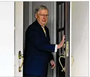  ?? ALEX BRANDON / ASSOCIATED PRESS ?? Senate Majority Leader Mitch McConnell of Kentucky leaves the White House’s West Wing last month to speak with reporters after a GOP senators’ meeting with President Donald Trump.