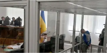  ?? ?? Vadim Shishimari­n spoke to the Kyiv court from a glass dock reserved for defendants